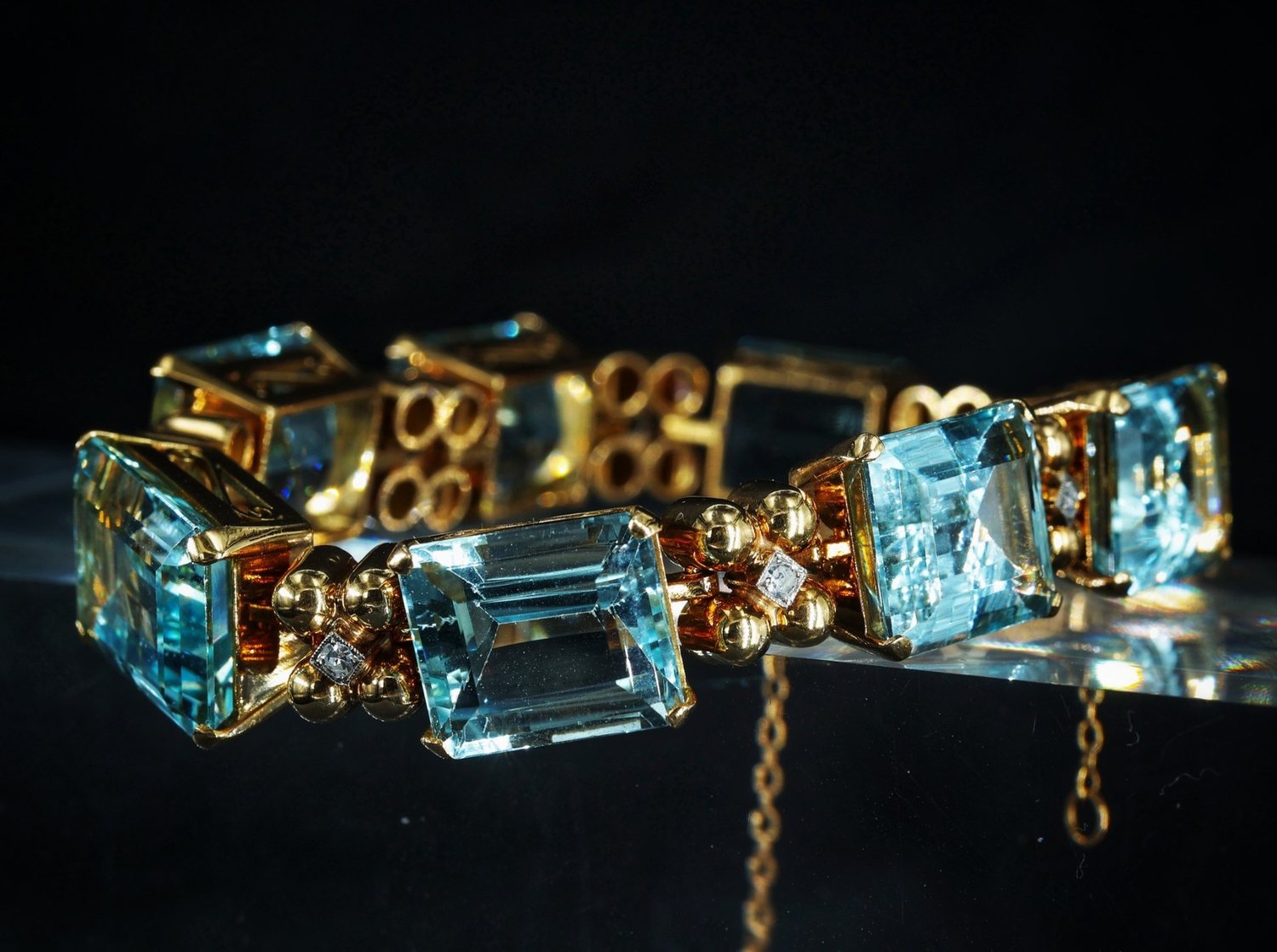 An aquamarine and gold bracelet