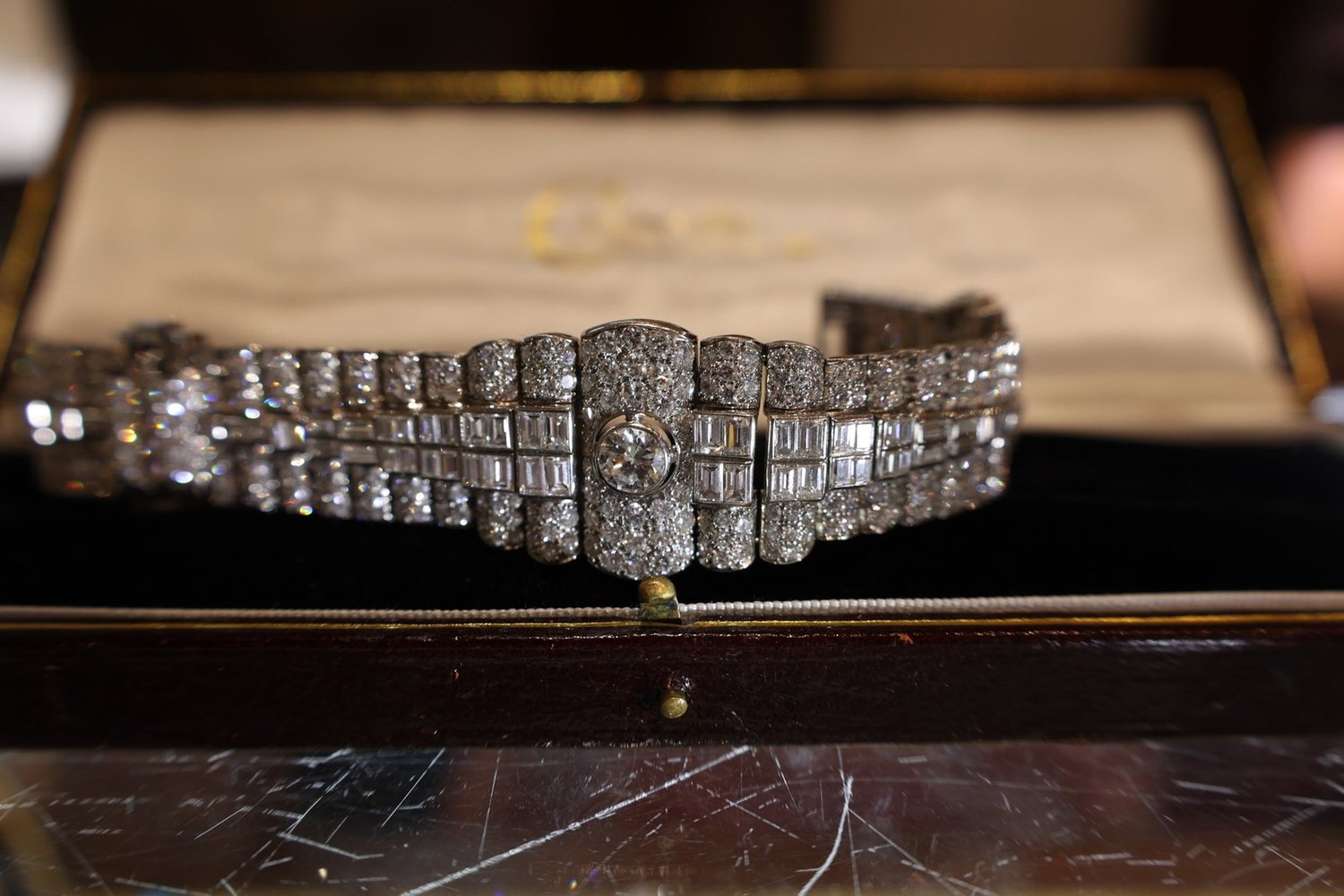 An Art Deco diamond bracelet in its fitted case