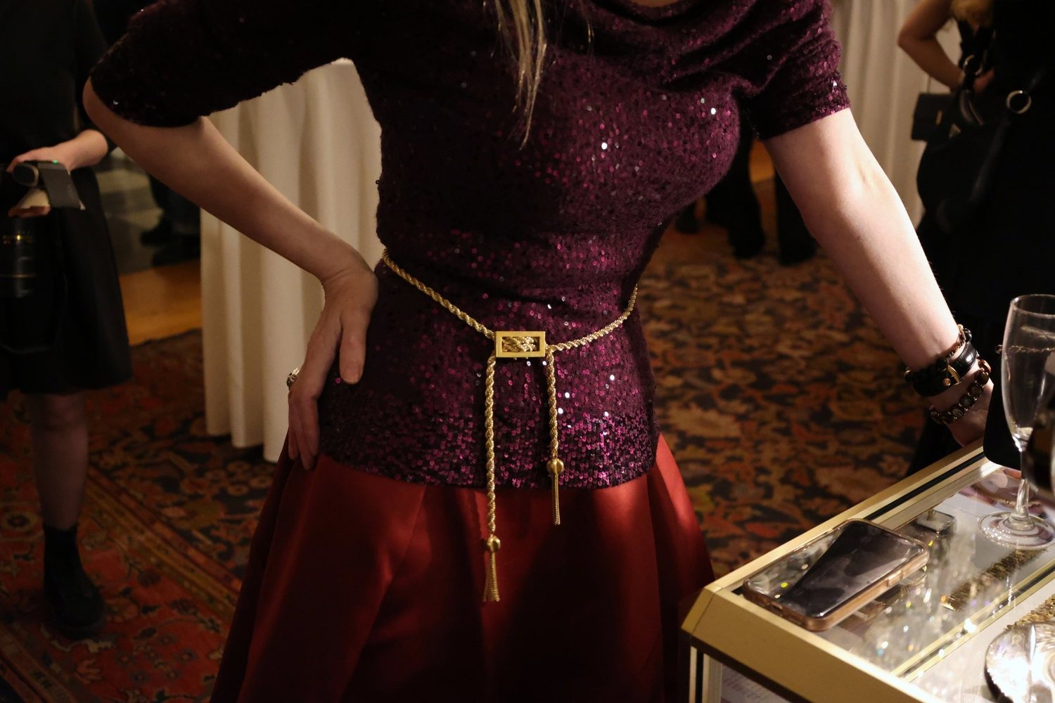A gold rope belt worn at a selling exhibition
