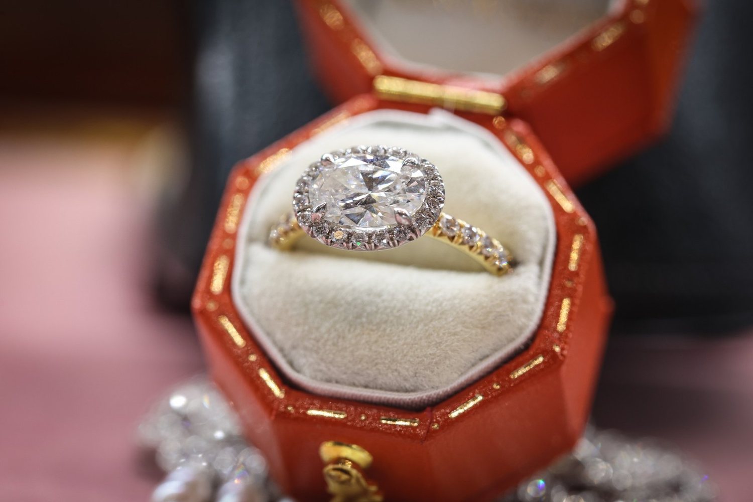 A diamond ring in its box