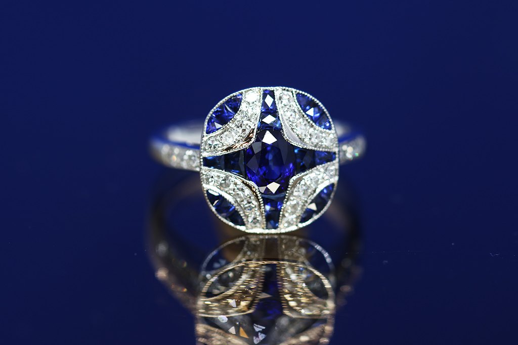 An Art Deco style sapphire and diamond ring