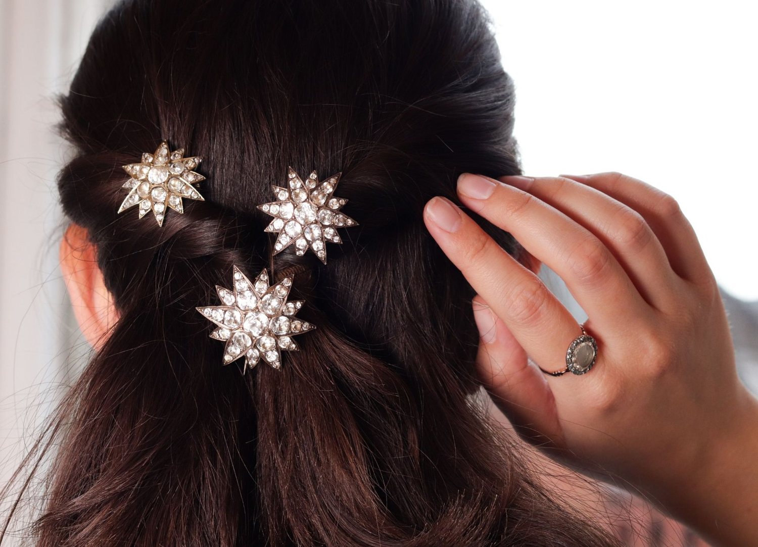 Three Victorian diamond star ornaments worn in the hair